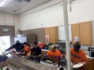 Food bank Mar 25, 2025 (Volunteers sharing food)